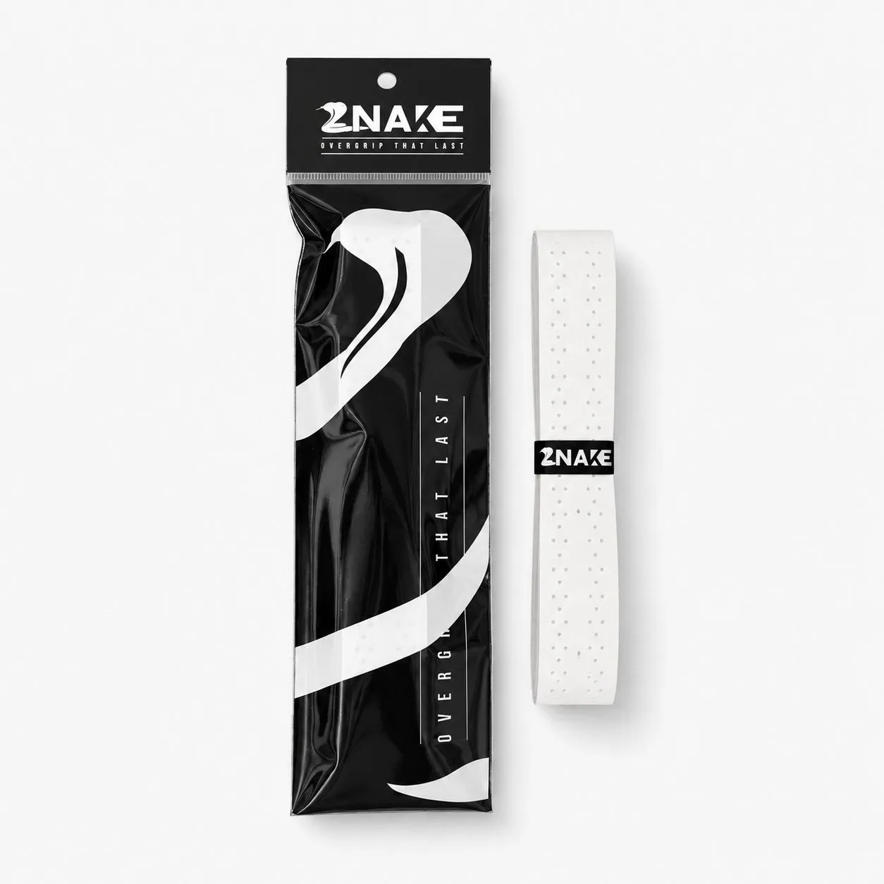 Znake overgrip för padel i förpackning bredvid ett utrullat grepp